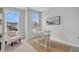 Home office with natural light, neutral walls, and minimalist desk setup at 110 Brown Swiss Cir, Summerville, SC 29483