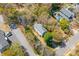 Charming two-story home with well-maintained yard and mature trees, providing privacy and shade at 1100 Sea Island Crossing Ln, Mount Pleasant, SC 29464
