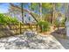 Attractive outdoor patio with a fire pit and wooden fencing at 1100 Sea Island Crossing Ln, Mount Pleasant, SC 29464