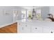 Spacious kitchen with island, seating, and abundant natural light at 1100 Sea Island Crossing Ln, Mount Pleasant, SC 29464