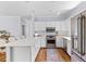 Modern kitchen boasts stainless steel appliances and an expansive island with seating at 1100 Sea Island Crossing Ln, Mount Pleasant, SC 29464