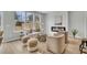 Cozy living room with an electric fireplace, modern decor, and plenty of natural light at 112 Brown Swiss Cir, Summerville, SC 29483