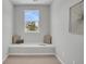 Bright window nook with built-in seating, cushions, and a view of the outdoors at 112 Brown Swiss Cir, Summerville, SC 29483