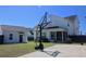 Large backyard featuring basketball hoop, patio, privacy fence, and detached garage at 112 Carpenter St, Summerville, SC 29486
