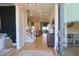 Inviting foyer with hardwood floors, elegant staircase, and a view into the beautifully decorated living spaces at 112 Carpenter St, Summerville, SC 29486