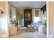 Cozy living room featuring a decorative cabinet, stylish furnishings, and an abundance of natural light at 112 Carpenter St, Summerville, SC 29486