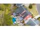 Aerial view of a home with a backyard featuring a pool, hot tub, and outdoor living spaces at 1149 Lands End Dr, Hanahan, SC 29410