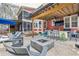 Relax in your backyard with a pool, hot tub, outdoor kitchen, covered patio, and fire pit at 1149 Lands End Dr, Hanahan, SC 29410