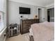 Cozy bedroom setup featuring a TV, stylish furnishings, and comfortable bedding at 1149 Lands End Dr, Hanahan, SC 29410