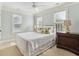 Bright bedroom with a ceiling fan, large windows, and neutral decor at 1149 Lands End Dr, Hanahan, SC 29410