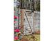 Charming wooden garden gate with stylish hardware, enhancing the property's curb appeal at 1149 Lands End Dr, Hanahan, SC 29410