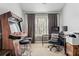 Functional home office with a desk, computer setup, and an arcade game at 1149 Lands End Dr, Hanahan, SC 29410