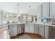 Spacious kitchen with stainless steel appliances, island, and a cozy dining nook with large windows at 1149 Lands End Dr, Hanahan, SC 29410