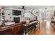 Open floor plan featuring hardwood floors, fireplace, and staircase at 1149 Lands End Dr, Hanahan, SC 29410