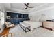 Bright main bedroom features a tray ceiling, ceiling fan, ensuite bathroom, and built-in storage at 1149 Lands End Dr, Hanahan, SC 29410