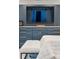 Built in cabinets below a wall-mounted television in the main bedroom at 1149 Lands End Dr, Hanahan, SC 29410