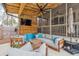 Inviting outdoor living space with comfortable seating, a fan, a TV, and a wooden pergola at 1149 Lands End Dr, Hanahan, SC 29410