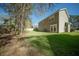 Large, well-maintained backyard features lush grass and ample space for recreation at 115 Trickle Dr, Summerville, SC 29483