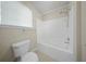 Bathroom with white toilet and shower-tub combo accented by a shower head at 115 Trickle Dr, Summerville, SC 29483