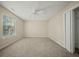Bright bedroom featuring carpet flooring, a window, and a closet with sliding doors at 115 Trickle Dr, Summerville, SC 29483