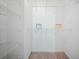 Walk-in closet with carpet flooring and metal storage shelves for optimal storage at 115 Trickle Dr, Summerville, SC 29483