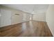 Open-concept living room featuring hardwood floors, bright windows, and neutral walls for a modern feel at 115 Trickle Dr, Summerville, SC 29483