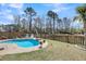 Backyard oasis with sparkling pool, lounging area and meticulously maintained landscaping at 1173 Triple Crown Court, Mount Pleasant, SC 29429