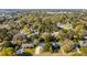 Residential neighborhood aerial view showing the home's location surrounded by lush trees, gardens, and other homes at 1200 Island View Dr, Mount Pleasant, SC 29464