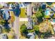 Aerial view showcases the home's location, driveway, and a backyard featuring a pool and mature trees at 1200 Island View Dr, Mount Pleasant, SC 29464