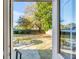 Expansive backyard with patio furniture, lush trees, and a well-maintained lawn at 1200 Island View Dr, Mount Pleasant, SC 29464