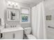 Bathroom featuring white cabinets, a vanity with marble countertop, and natural light at 1200 Island View Dr, Mount Pleasant, SC 29464