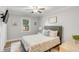 Bedroom featuring a ceiling fan, two windows, and comfortable furnishings at 1200 Island View Dr, Mount Pleasant, SC 29464