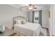 Comfortable bedroom featuring neutral colors, ceiling fan, and natural light from the window at 1200 Island View Dr, Mount Pleasant, SC 29464