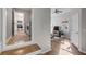 Hallway view with laundry room on left and living room on right, seamlessly connecting spaces at 1200 Island View Dr, Mount Pleasant, SC 29464