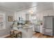Well-lit kitchen with stainless appliances, granite countertops, and white cabinets at 1200 Island View Dr, Mount Pleasant, SC 29464