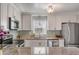 Well-equipped kitchen with granite countertops, white cabinetry, and stainless steel appliances at 1200 Island View Dr, Mount Pleasant, SC 29464