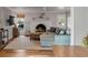 Inviting living room featuring a decorative fireplace, light blue sofa, and a view of the backyard at 1200 Island View Dr, Mount Pleasant, SC 29464