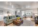 Spacious living room with a fireplace and an adjacent dining area, perfect for entertaining at 1200 Island View Dr, Mount Pleasant, SC 29464