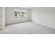 Bright bedroom with neutral carpeting and a double window allowing ample natural light at 123 Moscato Ln, Summerville, SC 29485