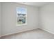 Sunlit bedroom with soft carpet and view of the neighborhood at 123 Moscato Ln, Summerville, SC 29485