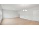 Spacious living area features hardwood floors, neutral walls, and ample natural light for a bright and inviting atmosphere at 123 Moscato Ln, Summerville, SC 29485