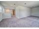 Large loft featuring neutral walls, carpeted floor, and natural light at 125 Royal Cainhoy Way, Huger, SC 29450