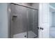 Glass shower with gray tile at 125 Royal Cainhoy Way, Huger, SC 29450