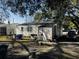 A detached shed and a small, fenced yard add privacy at 1255 Remount Rd, North Charleston, SC 29406