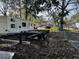 A trailer with wheels sits in the yard at 1255 Remount Rd, North Charleston, SC 29406