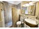 Bathroom featuring a modern walk-in shower and decorative vanity at 1300 Ocean Blvd # 139, Isle of Palms, SC 29451