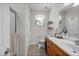 Bright bathroom featuring tiled floor, a shower, and decor at 1309 Basketweaver Way, Hanahan, SC 29410