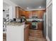 Bright kitchen featuring granite countertops, stainless steel appliances, and ample cabinet space at 1309 Basketweaver Way, Hanahan, SC 29410
