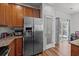 Kitchen features stainless steel appliances, granite countertops and a pantry at 1309 Basketweaver Way, Hanahan, SC 29410
