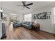 Comfortable living room with stylish decor, hardwood floors, and ample natural light at 1309 Basketweaver Way, Hanahan, SC 29410